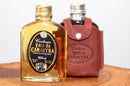1 CACHAÇA ARTESANAL VALE DA CANASTRA OURO COM CAPA DE COURO - 160 ML